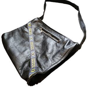 Sport Your Team Spirit in Style with this Oregon Ducks Leather Purse!